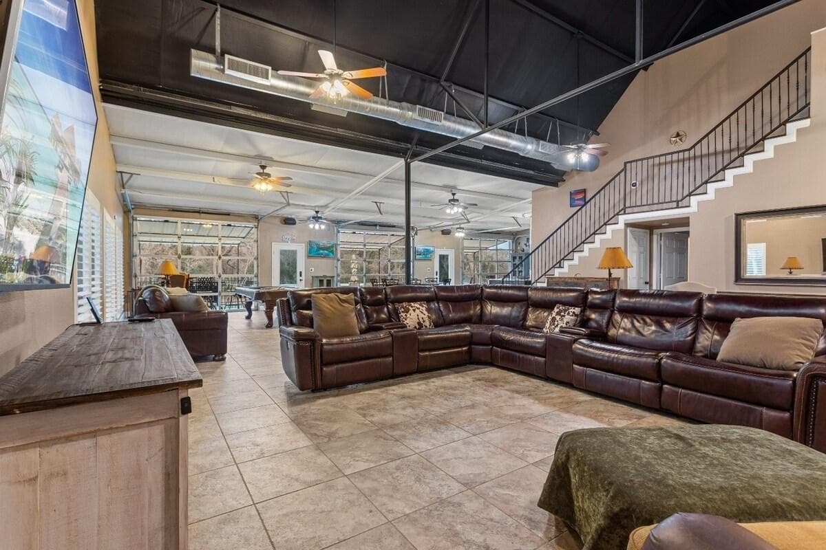 Welcome to the space you've always dreamed of! With the freedom to relax in our open living room, sink into our cozy, L-shaped sectional couch, and watch TV while reclining, it's the ultimate chill-out zone. So, why wait? 